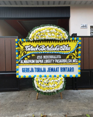 Papan Bunga Duka di Kedaleman